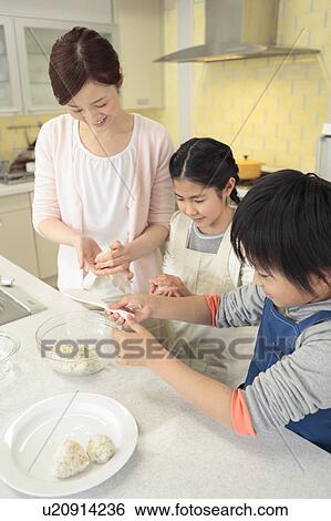 Mother and children cooking rice ball View Large Photo Image Stock Photograph - Mother and children cooking rice ball. Fotosearch