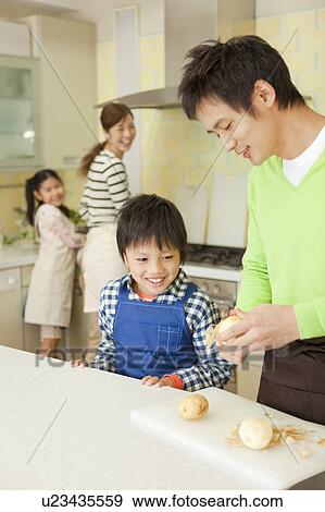 Parents and children cooking View Large Photo Image Stock Photo - Parents and children cooking. Fotosearch