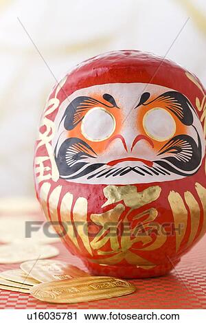 Daruma doll and gold coin View Large Photo Image Stock Image - Daruma doll and gold coin. Fotosearch
