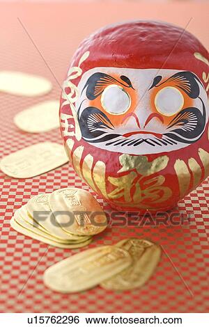Daruma doll and gold coin View Large Photo Image Stock Photograph - Daruma doll and gold coin. Fotosearch