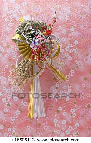 Stock Image - Decoration of straw rope for new year. Fotosearch