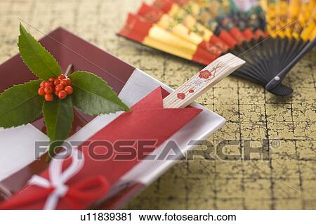 Stock Image - Fan and chopsticks. Fotosearch
