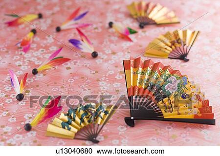 Stock Image - Fan and shuttle cock. Fotosearch
