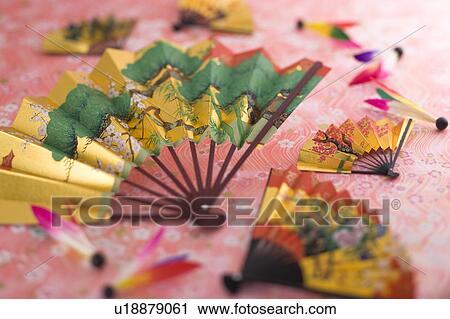 Stock Image - Fan and shuttle cock. Fotosearch
