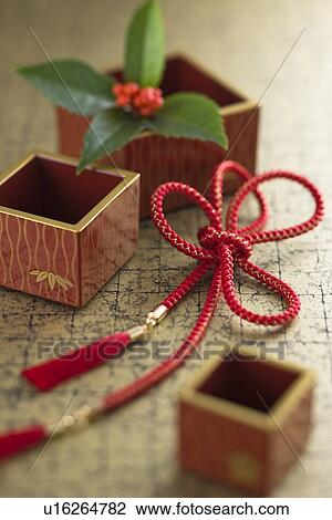 Stock Image - Japanese wooden measure cup. Fotosearch