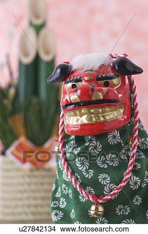 Picture - Lion dance and kadomatsu. Fotosearch