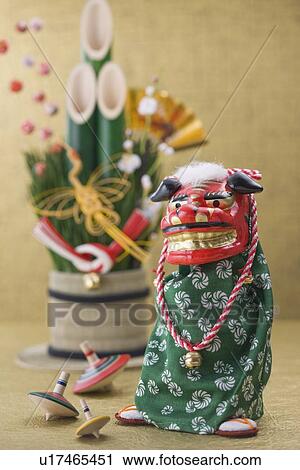 Stock Image - Lion dance and kadomatsu. Fotosearch
