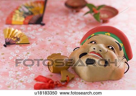 Mask of budai and sake cup View Large Photo Image Stock Image - Mask of budai and sake cup. Fotosearch