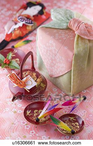 Stock Image - Nest of boxes with wrapping cloth. Fotosearch
