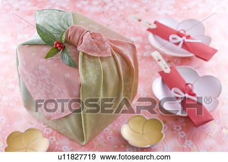 Stock Photo - Nest of boxes with wrapping cloth. Fotosearch
