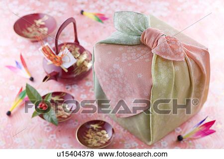 Stock Photo - Nest of boxes with wrapping cloth. Fotosearch