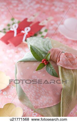 Stock Photo - Nest of boxes with wrapping cloth. Fotosearch