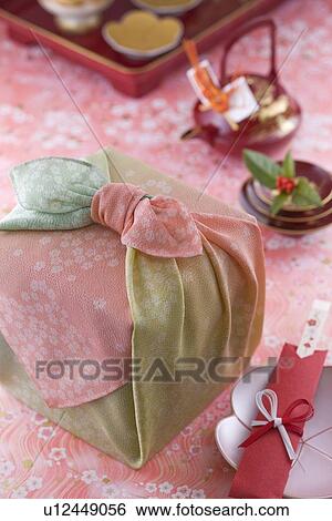 Stock Photograph - Nest of boxes with wrapping cloth. Fotosearch
