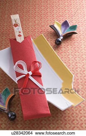 Picture - Plate and chopsticks. Fotosearch