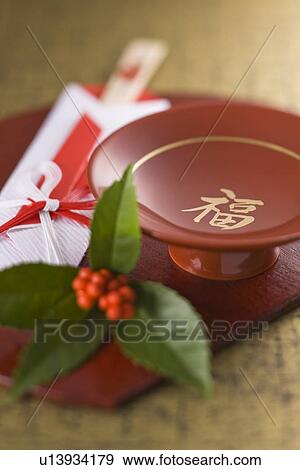 Sake cup and chopsticks on tray View Large Photo Image Stock Photo - Sake cup and chopsticks on tray. Fotosearch