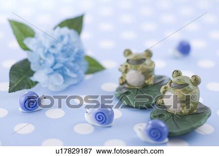 Frog and snail ornament View Large Photo Image Stock Photo - Frog and snail ornament. Fotosearch