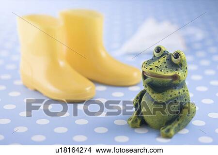 Frog ornament and rain boots View Large Photo Image Picture - Frog ornament and rain boots. Fotosearch