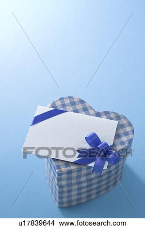 Heart shaped box and message card View Large Photo Image Picture - Heart shaped box and message card. Fotosearch