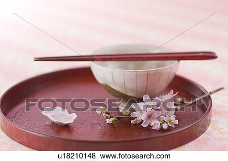 Stock Photo - Rice bowl and cherry blossoms. Fotosearch