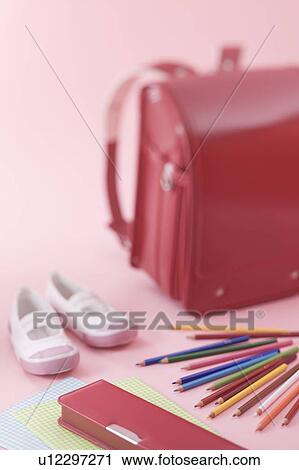 Stock Image - School bag and stationery. Fotosearch