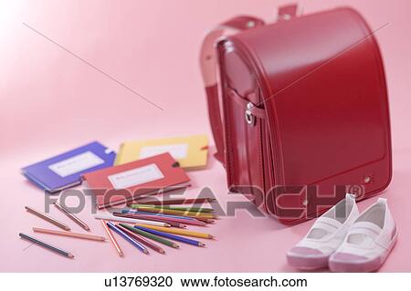 Stock Image - School bag and stationery. Fotosearch