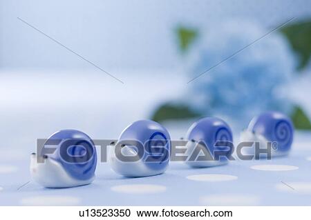 Stock Image - Snail ornament. Fotosearch