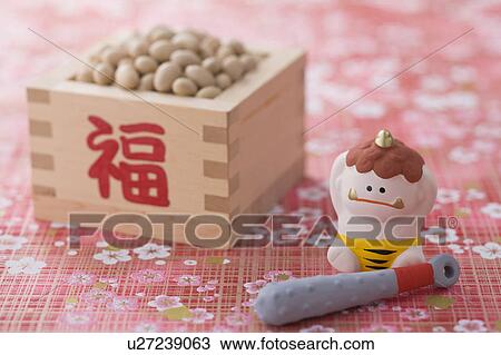 Stock Image - Soybean and ornament of evil. Fotosearch