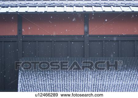 Stock Photo - Japanese traditional building and snow. Fotosearch