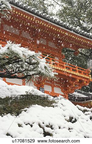 Stock Photo - Shinto shrine with snow. Fotosearch