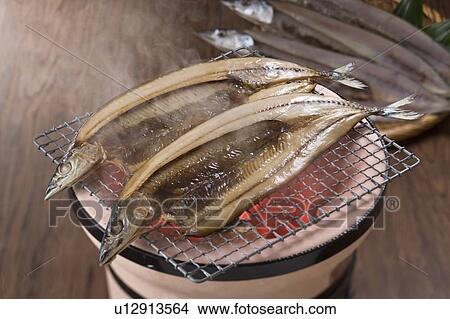 Picture - Char grilled saury. Fotosearch
