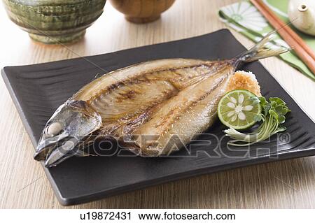 Stock Image - Grilled mackerel. Fotosearch
