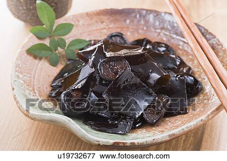 Stock Photo - Mushroom and kelp boiled in soy sauce. Fotosearch