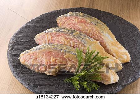 Stock Photo - Salmon fillet with saikyo miso. Fotosearch