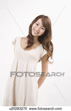 Stock Image - Portrait of young woman. Fotosearch
