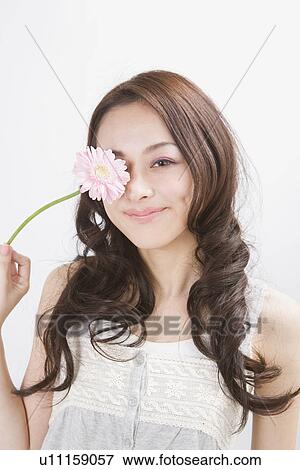 Portrait of young woman View Large Photo Image Stock Photo - Portrait of young woman. Fotosearch