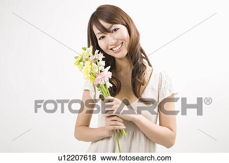 Portrait of young woman View Large Photo Image Stock Photo - Portrait of young woman. Fotosearch