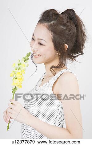 Stock Photo - Portrait of young woman. Fotosearch