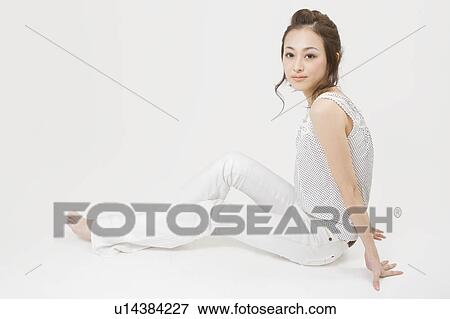 Portrait of young woman View Large Photo Image Stock Photo - Portrait of young woman. Fotosearch