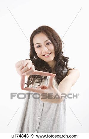 Portrait of young woman View Large Photo Image Stock Photo - Portrait of young woman. Fotosearch