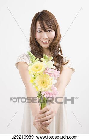 Stock Photo - Portrait of young woman. Fotosearch