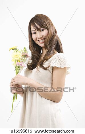 Stock Photography - Portrait of young woman. Fotosearch