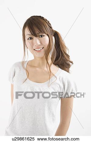 Stock Photography - Portrait of young woman. Fotosearch