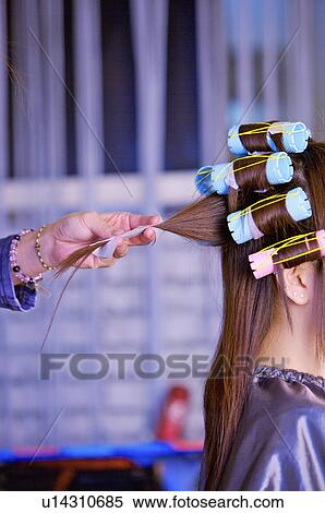Young woman having her hair curled, Hair Salon View Large Photo Image Stock Photography - Young woman having her hair curled, Hair Salon. Fotosearch