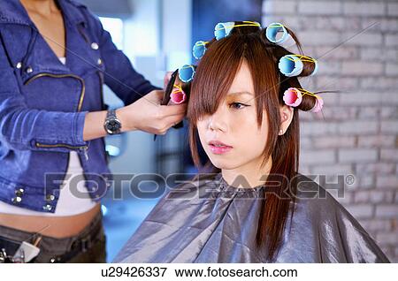 Young woman having her hair washed, Hair Salon View Large Photo Image Stock Photo - Young woman having her hair washed, Hair Salon. Fotosearch