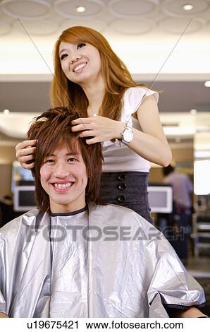 Hairdresser giving advice for customer, Hair Salon View Large Photo Image Stock Image - Hairdresser giving advice for customer, Hair Salon. Fotosearch