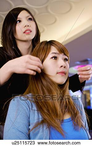 Hairdresser giving advice for customer, Hair Salon View Large Photo Image Stock Image - Hairdresser giving advice for customer, Hair Salon. Fotosearch