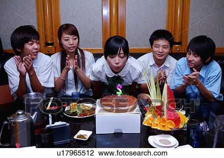 Teenagers celebrating birthday for a girl and applauding together, Teenager View Large Photo Image Stock Image - Teenagers celebrating birthday for a girl and applauding together, Teenager. Fotosearch