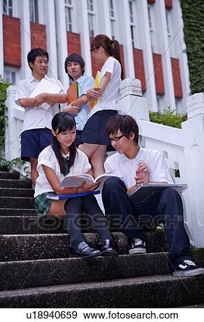 Teenagers discussing outdoors, Teenager View Large Photo Image Stock Photo - Teenagers discussing outdoors, Teenager. Fotosearch