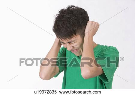 Portrait of man frowning, Men, Facial Expression View Large Photo Image Stock Photography - Portrait of man frowning, Men, Facial Expression. Fotosearch