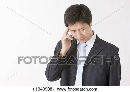 Portrait of man looking down and contemplating, Men, Facial Expression View Large Photo Image Stock Photo - Portrait of man looking down and contemplating, Men, Facial Expression. Fotosearch